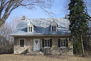 Restauration d'une maison historique à Saint-Laurent